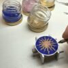 Montre Soleil rouge, émail Grand Feu cloisonné
